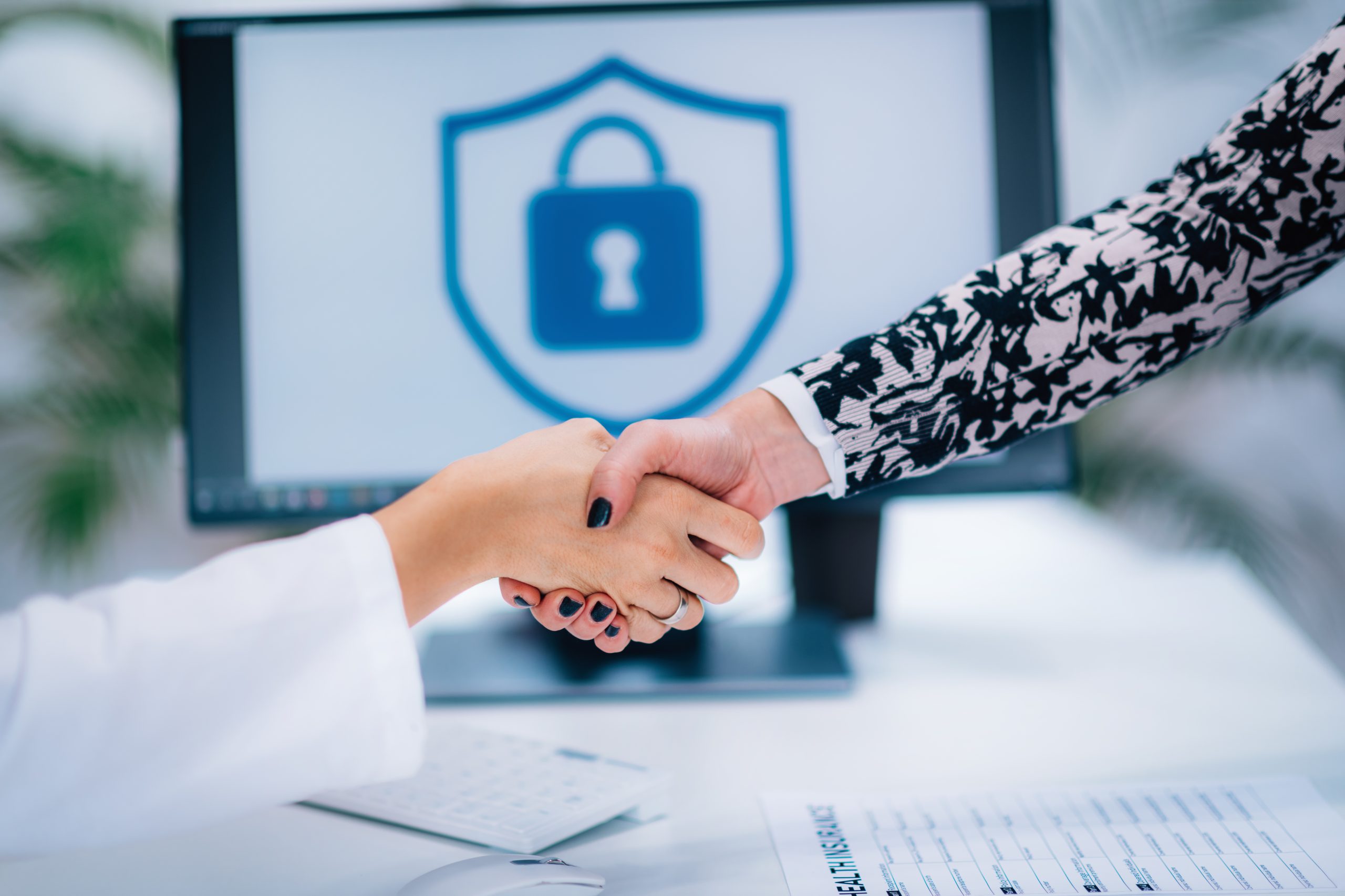Handshake after signing medical data form 2024 10 20 09 46 19 utc